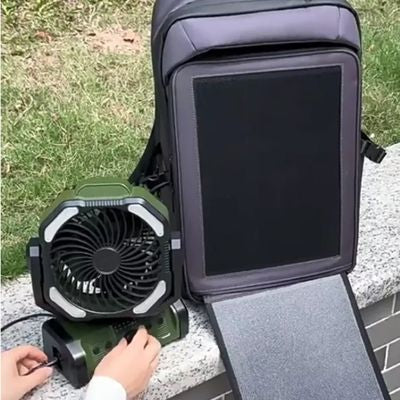 Femme sac a dos energie solaire charge ventilateur