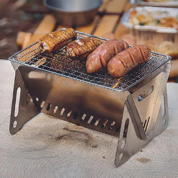 Barbecue pliable GrillFlam petit modèle avec saucisses